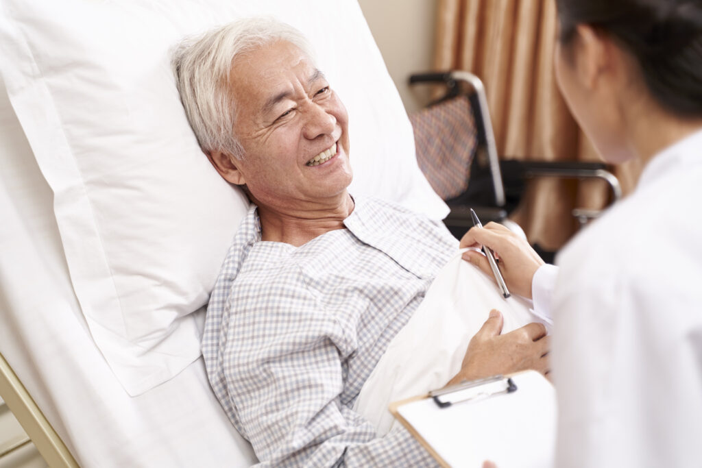 Physiotherapist assisting patient recovery
